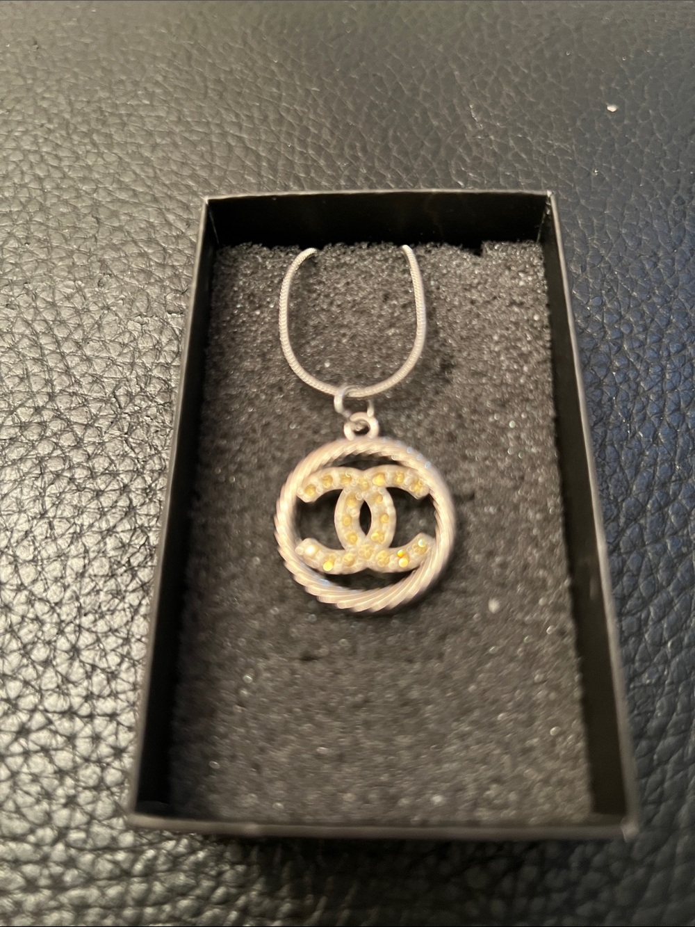 CHANEL SILVER ROUND STAMPED  CHARM with CRYSTALS and 925 CHAIN